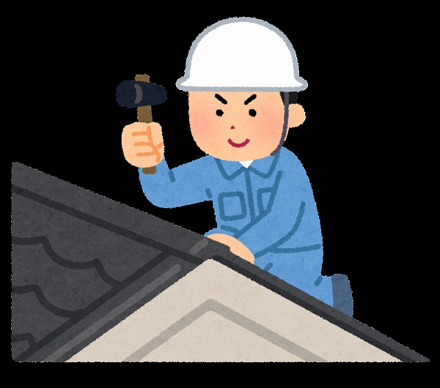 屋根を修理する作業員